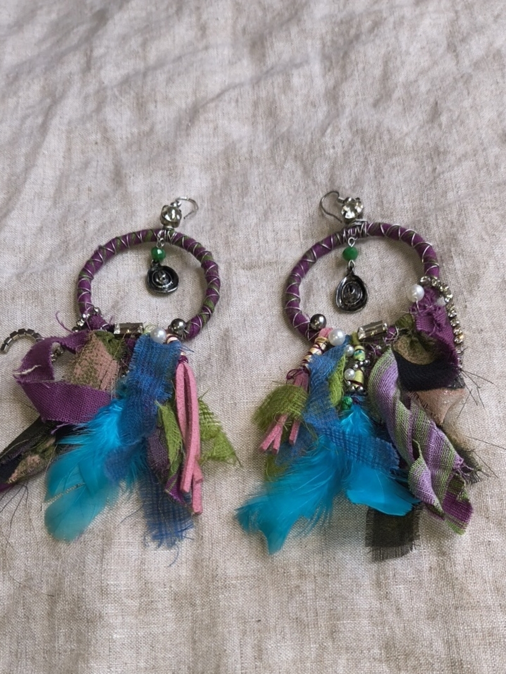A Rare Bird Handcrafted Purple Hoop Earrings with Teal Feather Accents Bohemian